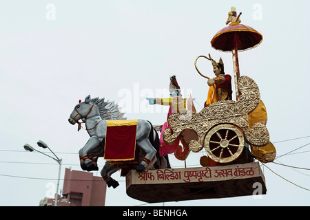 Idol of Lord Krishna driving the rath of Arjun on Ganesh Chaturthi a day on which Lord Ganesha the son of Shiva and Parvati is Stock Photo