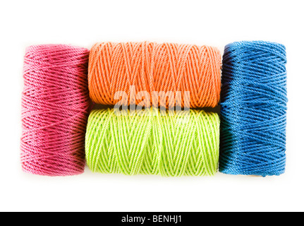 four colorful cord spools Stock Photo