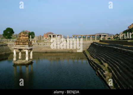 Pushkarni or step well adjacent to Krishna Bazaar in Krishna Temple a partly collapsed temple located south of Hemakuta Hill Stock Photo