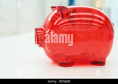 Side view of empty transparent piggy bank isolated on white Stock Photo ...