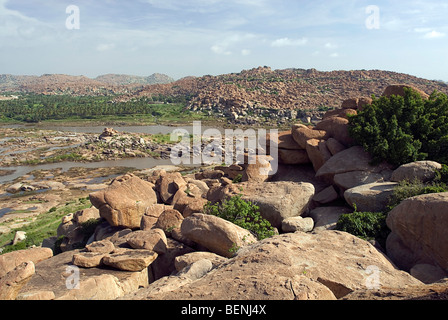 Hampi situated on the banks of the Tungabhadra River located within the ruins of Vijayanagara is a village in Karnataka India Stock Photo