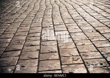 Cobbles on the street - can be used as background Stock Photo