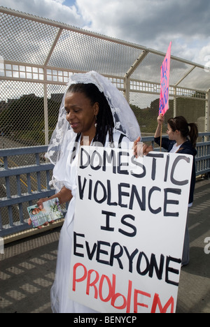 Women dressed as brides march in the 9th Annual Gladys Ricart and Victims of Domestic Violence Memorial Walk Stock Photo