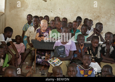 SOUTH SUDAN Kinji government primary school, Yei. Group of children in class, including one albino girl. Stock Photo