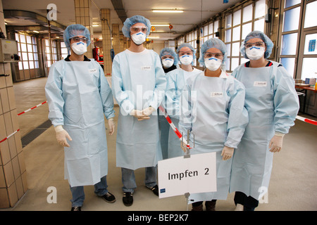 Exercise of a fire brigade, mass vaccination of people against a virus, pandemic exercise, Essen, Germany.
