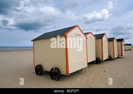 Row of colourful beach cabins on wheels along the North Sea coast at De Panne, Belgium Stock Photo