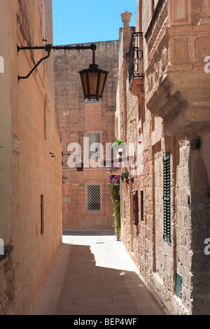 Typical narrow street in Mdina, Malta Stock Photo