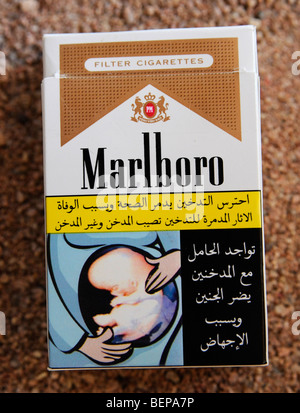 A health warning in arabic on a packet of Marlboro cigarettes Stock Photo