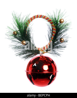 Red Christmas Bell with ribbon and pine branch Stock Photo
