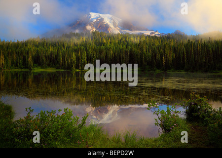 Misty Reflection at Mount Rainier's Reflection Lakes Stock Photo