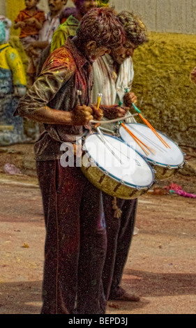 two young men drumming at a festival Stock Photo