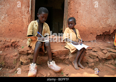 BURUNDI Boys doing their homework after school, Gitera. PHOTOGRAPH by Sean Sprague 2009 Stock Photo