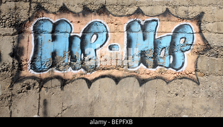 Graffiti hip hop inscription on the wall Stock Photo
