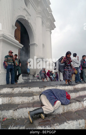 GUATEMALA Chichicastenango. Drunk man sleeping on steps of Catholic church. PHOTO by SEAN SPRAGUE 2009 Stock Photo