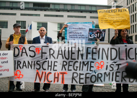 Iranian oppositors protesting against the Islamic government and demanding democracy in Iran, Branderburg Gate, Berlin, Germany Stock Photo