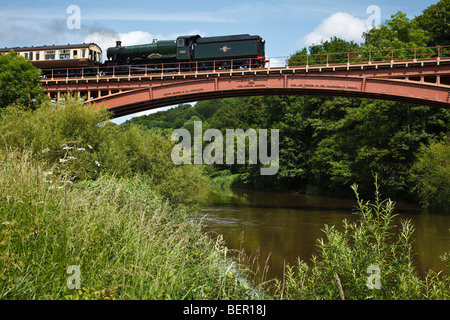 Steam train crossing Victoria Bridge over the River Severn, Severn Valley Railway, near Upper Arley, Hereford and Worcester
