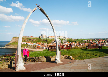 St Mary's church and Whitby abbey framed by Whale jaw bone arch on West Cliff, Whitby, North Yorkshire, England, UK. Stock Photo