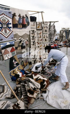 Decorative rug seller. Ecuador highlands local market. Stock Photo