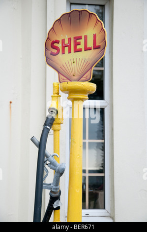Old fashioned and antique Shell petrol pump outside the Crag-ny-Baa pub on the TT race course on the Isle of Man Stock Photo