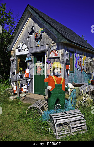 Interestingly decorated shed - the Timmon's Folk Art Store in Pleasant Bay in the Gulf of St Lawrence, Cabot Trail, Cape Breton, Stock Photo