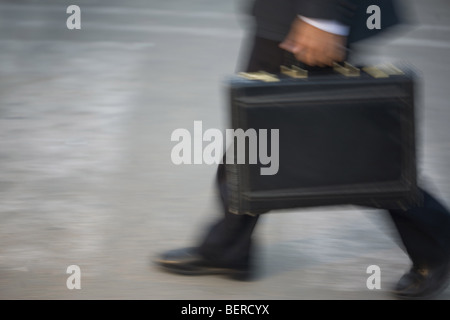 Man carrying a briefcase Stock Photo