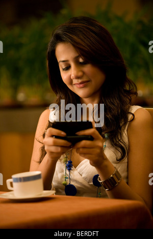 Woman looking at her mobile Stock Photo