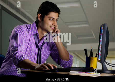 Executive working at his desk Stock Photo