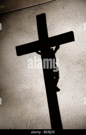 The Shadow of Jesus Cross on the Wall Stock Photo - Alamy