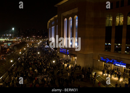 Fans arrive at Yankee Stadium in the New York borough of The Bronx Stock Photo