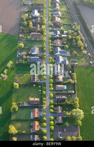 Ribbon development, urbanisation at the border of agricultural area ...