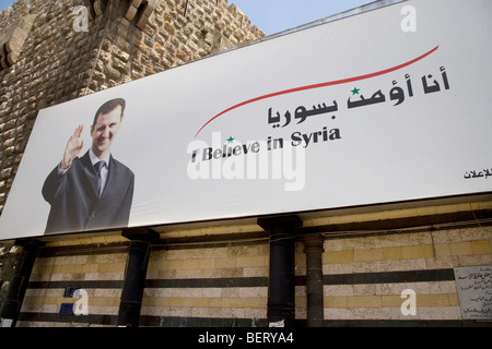 Poster, sign, billboard, banner with Bashar al-Assad smiling and saluting, Damascus, Syria, Middle East Stock Photo