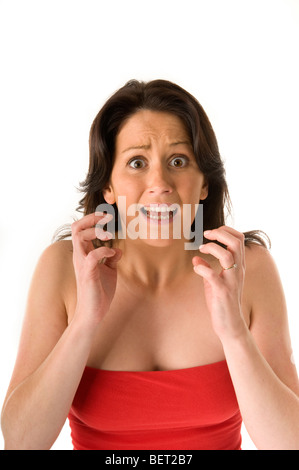 Young healthy Female shocked and fearful expression . FULLY MODEL RELEASED Stock Photo