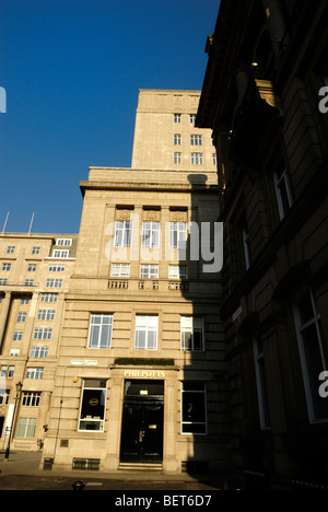 Brightly lit building with blue sky at Exchange Flags Liverpool UK Stock Photo