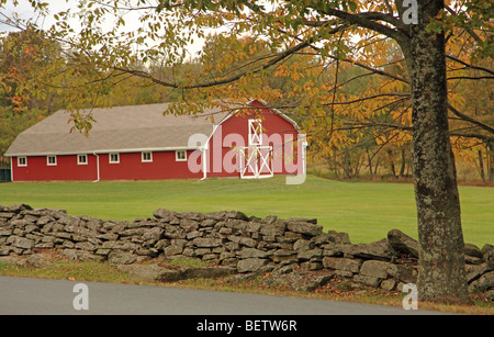 A traditional red American Dutch style barn in Fall in Ulster County,New York Stock Photo