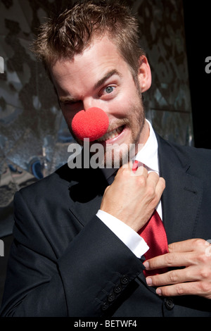 Businessman clowning around Stock Photo