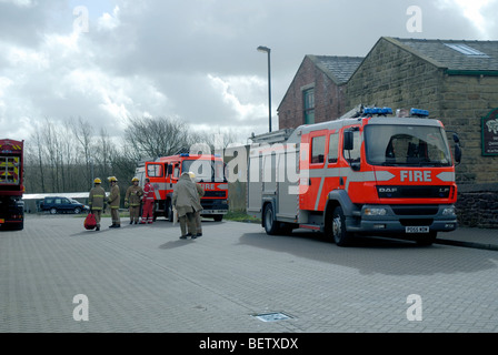 The Fire Brigade outside of the Queen Street MIll Textile Museum in Burnley in Lancashire Stock Photo