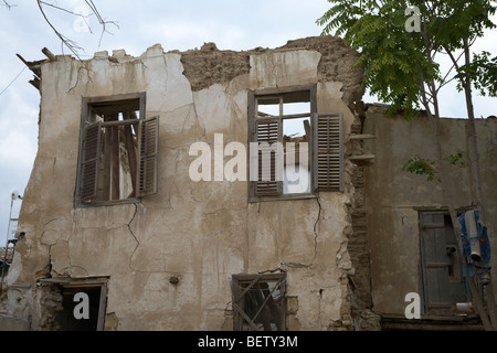 bombed out buildings in no mans land and restricted area of the UN buffer zone in the green line dividing north and south cyprus in nicosia border Stock Photo