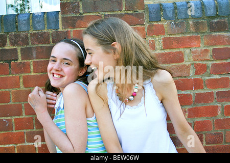 two girls larking around and having fun Stock Photo