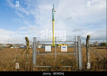 Housing for horizontal axis of Nordex N90 wind turbine being lifted into position on top of tower mast by crane UK Stock Photo