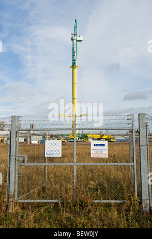 Housing for horizontal axis of Nordex N90 wind turbine being lifted into position on top of tower mast by crane UK Stock Photo