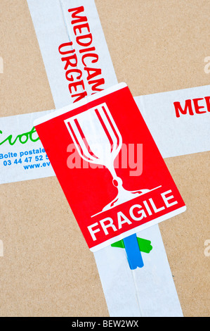 Fragile - Internationally recognized warning label information. Stock Photo