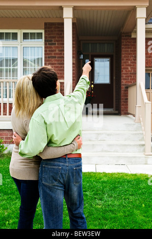 Young happy couple shopping for new home Stock Photo