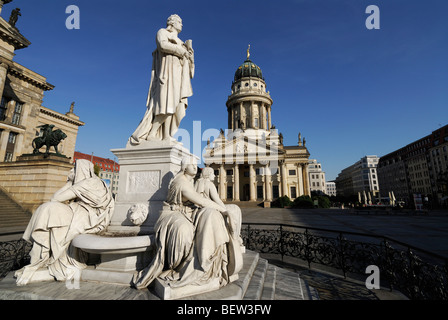 Berlin. Germany. Gendarmenmarkt. Statue of Friedrich Schiller and the French Cathedral Französischer Dom. Stock Photo