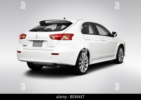 2010 Mitsubishi Lancer Sportback GTS in White - Rear angle view Stock Photo