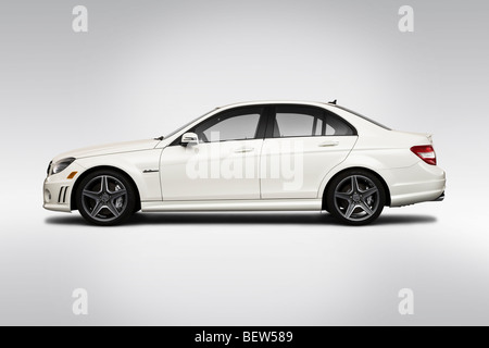 2010 Mercedes-Benz C-Class C63 AMG in White - Drivers Side Profile Stock Photo