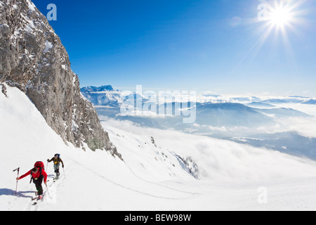 two men ski touring in the mountains, Salzburg, Austria, high angle view Stock Photo