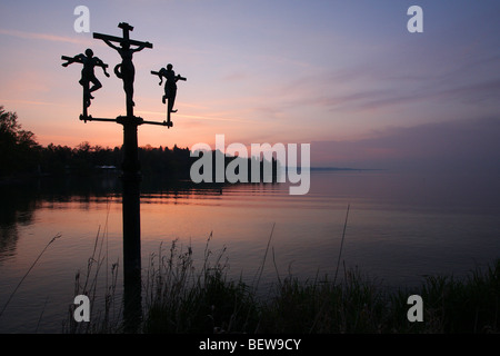 The Schwedenkreuz (Swedish Cross) on the Island of Mainau at dim, Lake Constance, Baden-Wuerttemberg, Germany, silhouette Stock Photo