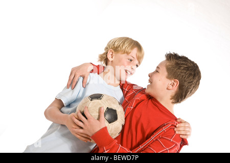 two boys with a football Stock Photo