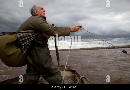 Commercial salmon fisherman with net on the River Ribble Uk Stock Photo