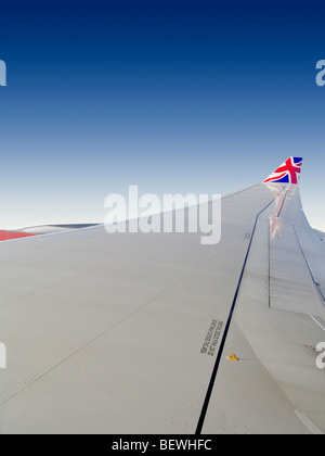 View of commercial airplane wing taken from window Stock Photo